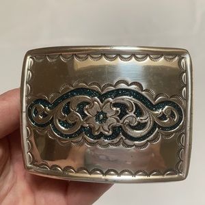 Silver belt buckle